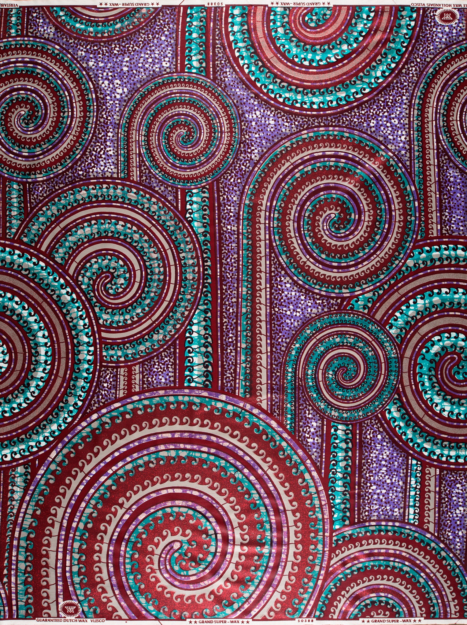 Vibrant patterned fabric deep purples grand super-wax vls0388.007
