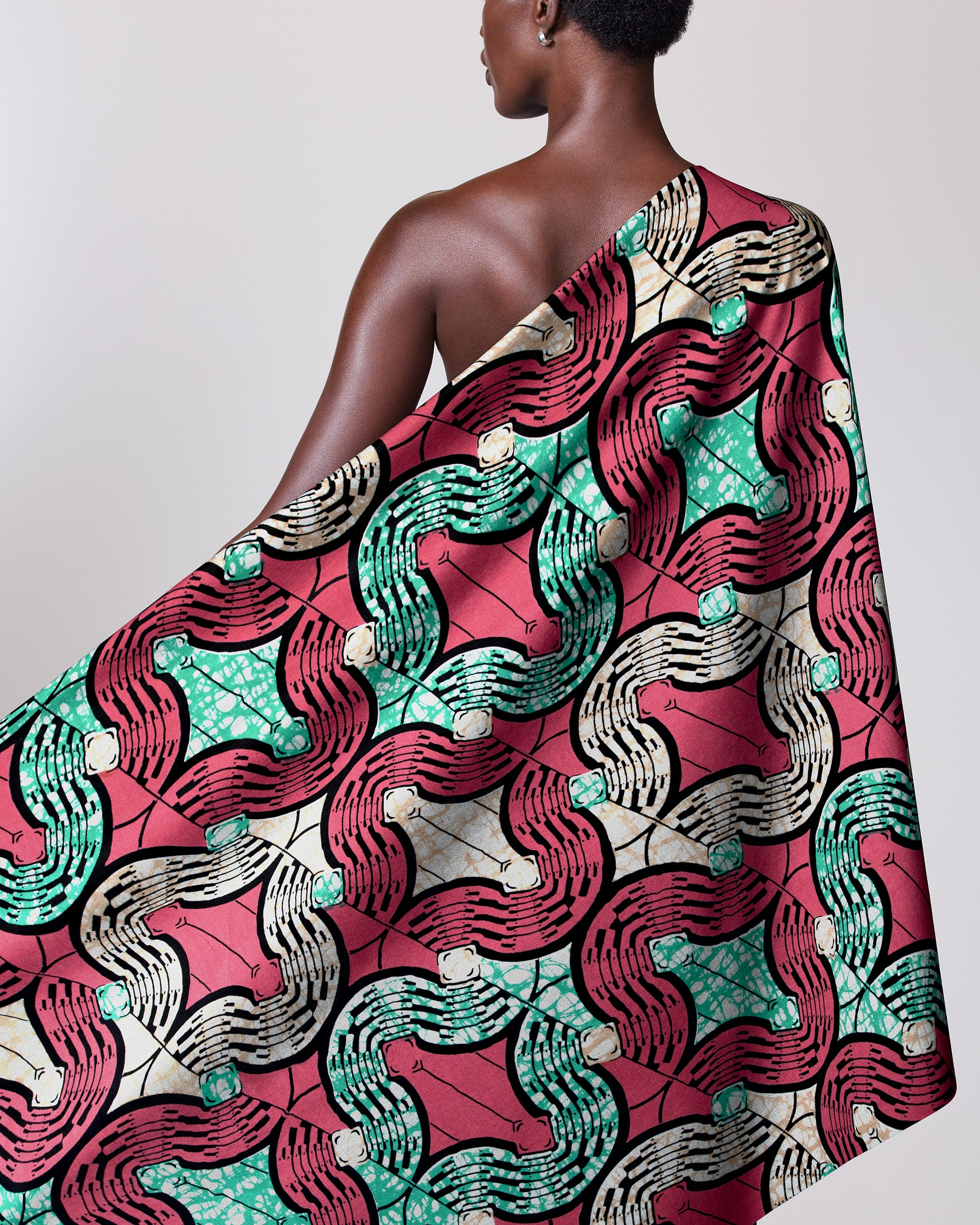 Vibrant patterned fabric draped model’s super-wax vls0476.013
