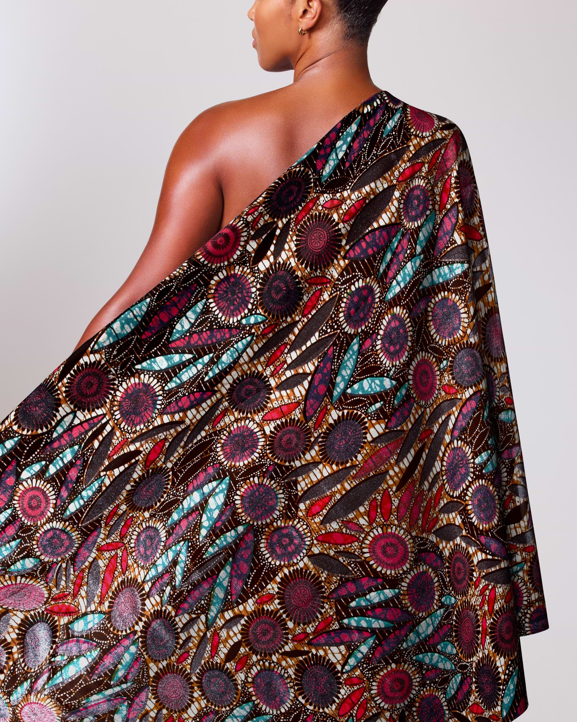 Colorful patterned fabric draped person’s grand super-wax vls0949.004