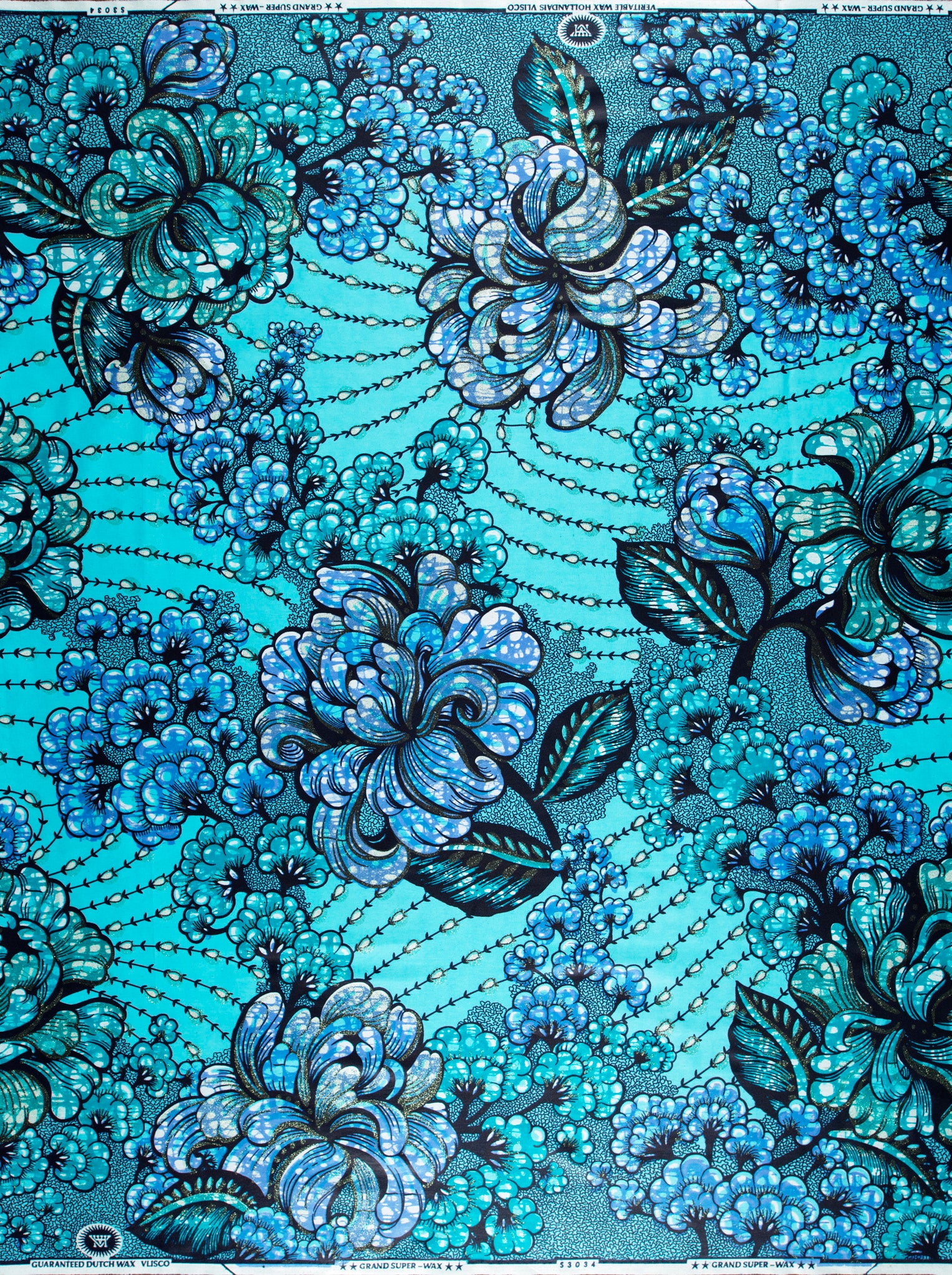 Vibrant turquoise fabric intricate blue grand super-wax vls3034.008