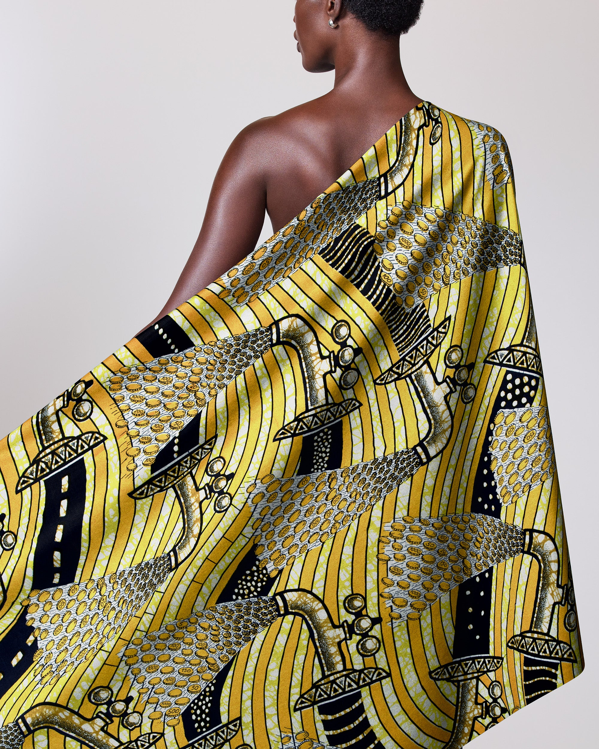 Yellow patterned fabric draped person super-wax vls3071.012