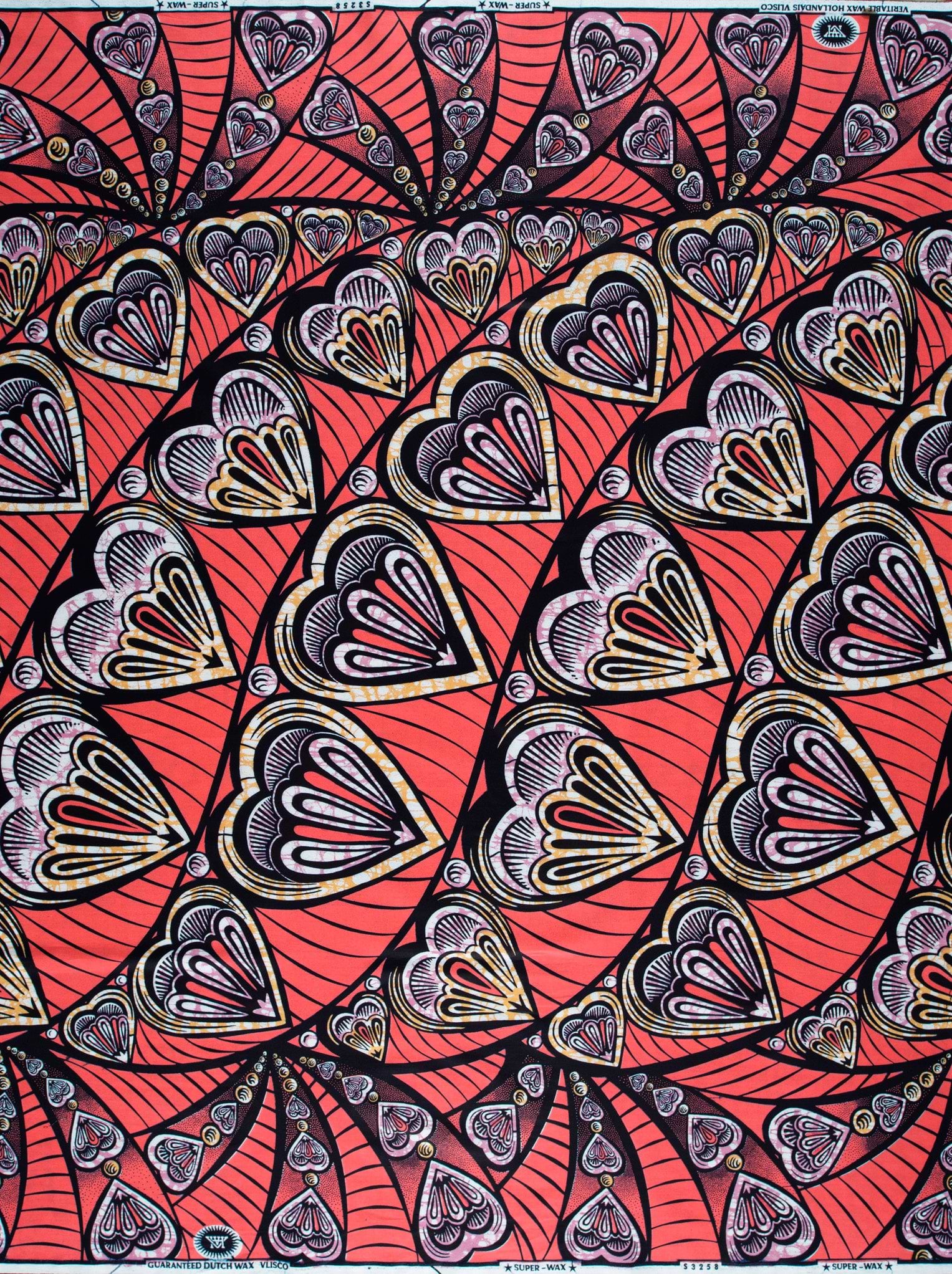 Vibrant red fabric intricate pattern super-wax vls3258.010