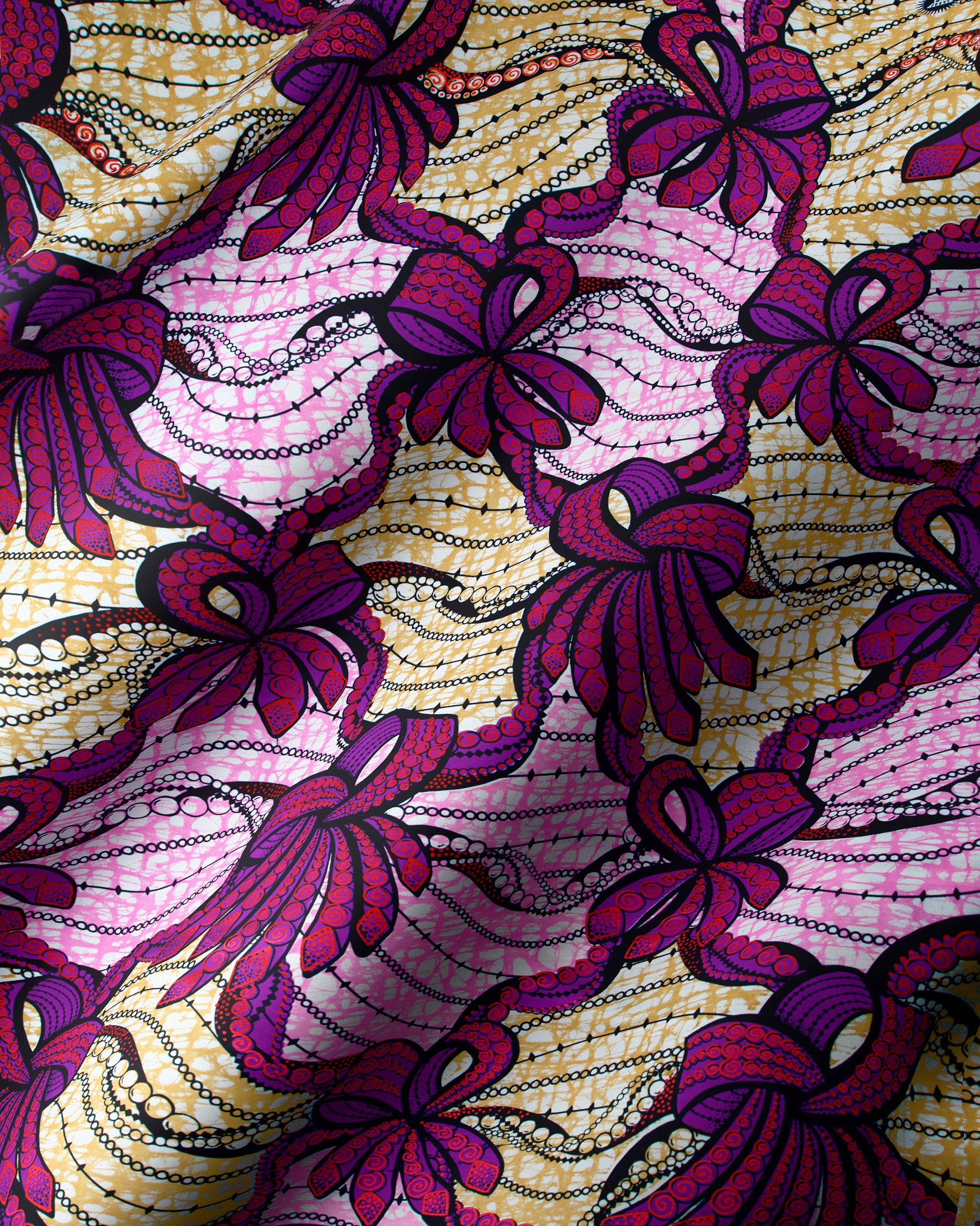 Vibrant purple pink bow-patterned fabric super-wax vls6394.025