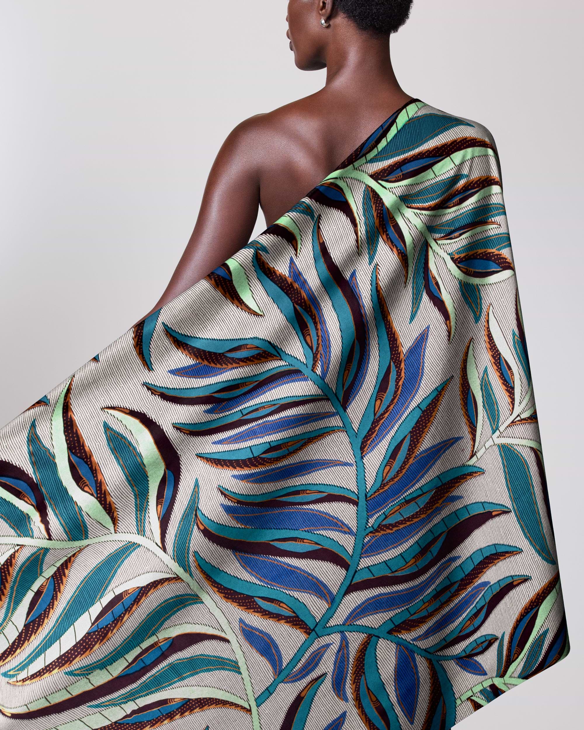 Woman wears one-shoulder wrap dress satin royal vlw7906.004