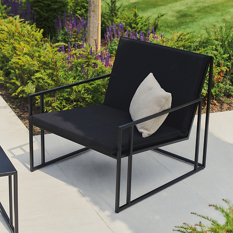 Our Rectangular Black Modern Garden Chair in a typical outdoor setting