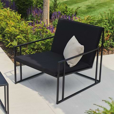 Our Rectangular Black Modern Garden Chair in a typical outdoor setting