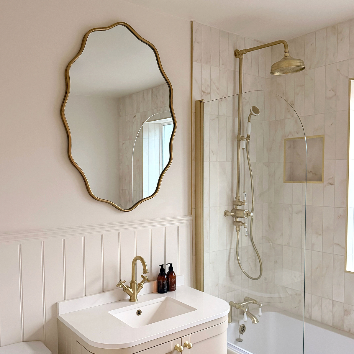 Sabrina - Gold Wavy Oval Metal Wall Mirror 100cm x 70cm