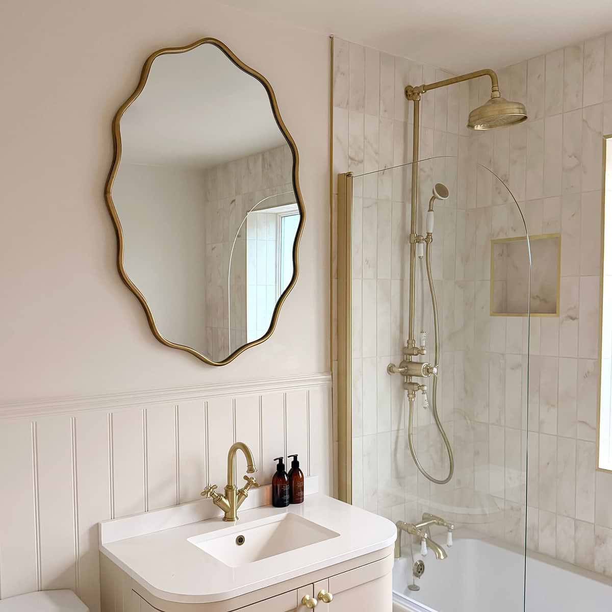 Sabrina - Gold Wavy Oval Metal Wall Mirror 100cm x 70cm