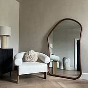 Extra Large Full Length Light Wood Irregular Mirror beside chair