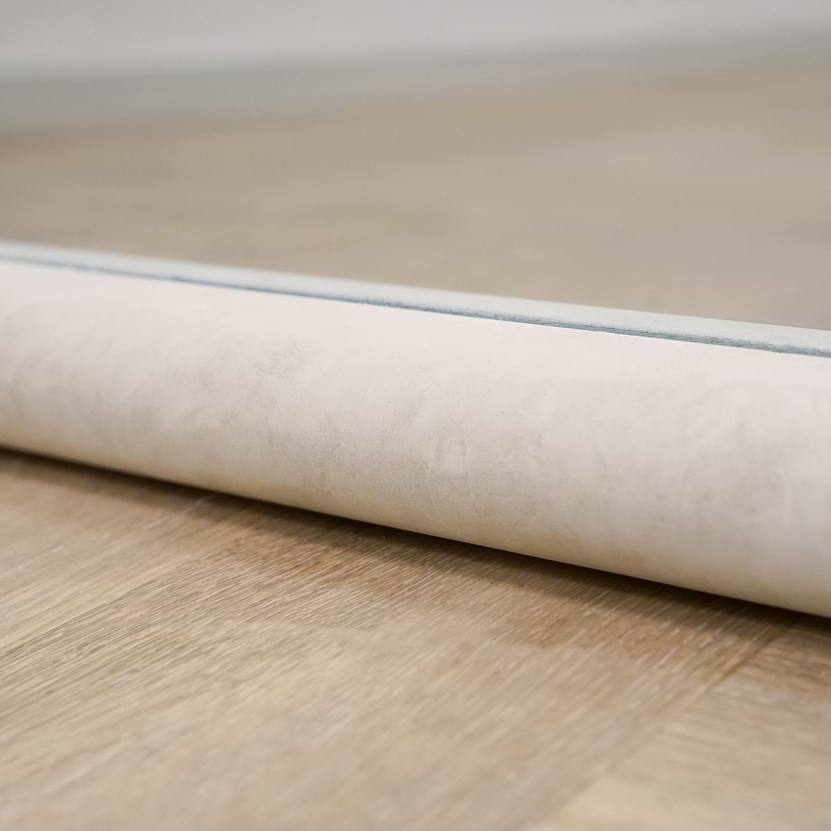 Closeup of Full length arched concrete mirror