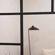 Black industrial full length metal window mirror detail shot