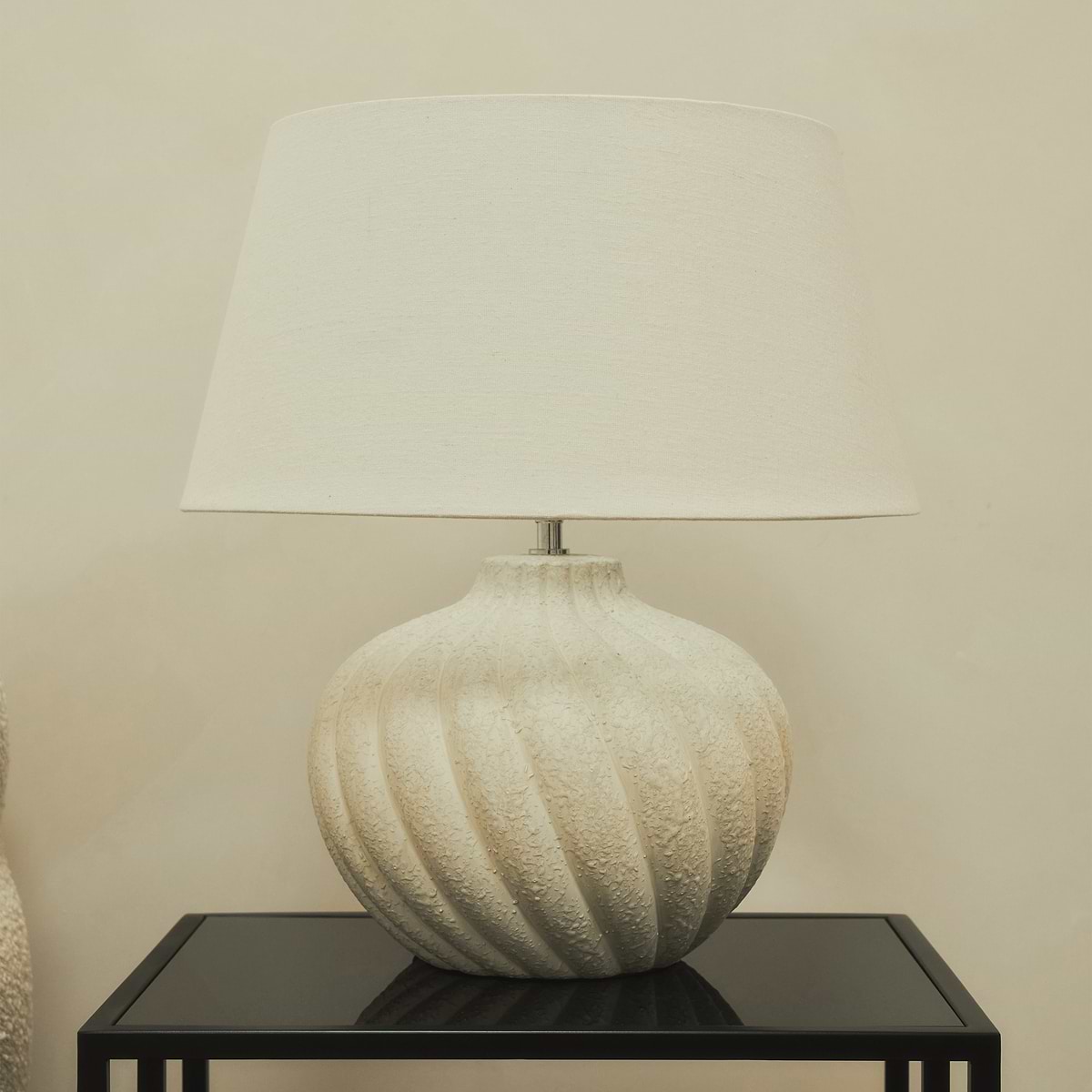Textured ceramic based table lamp natural shade on brookyln side table