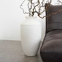 White Textured Terracotta Large Vase beside sofa