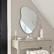 Small Frameless Pond Mirror displayed vertically above console table