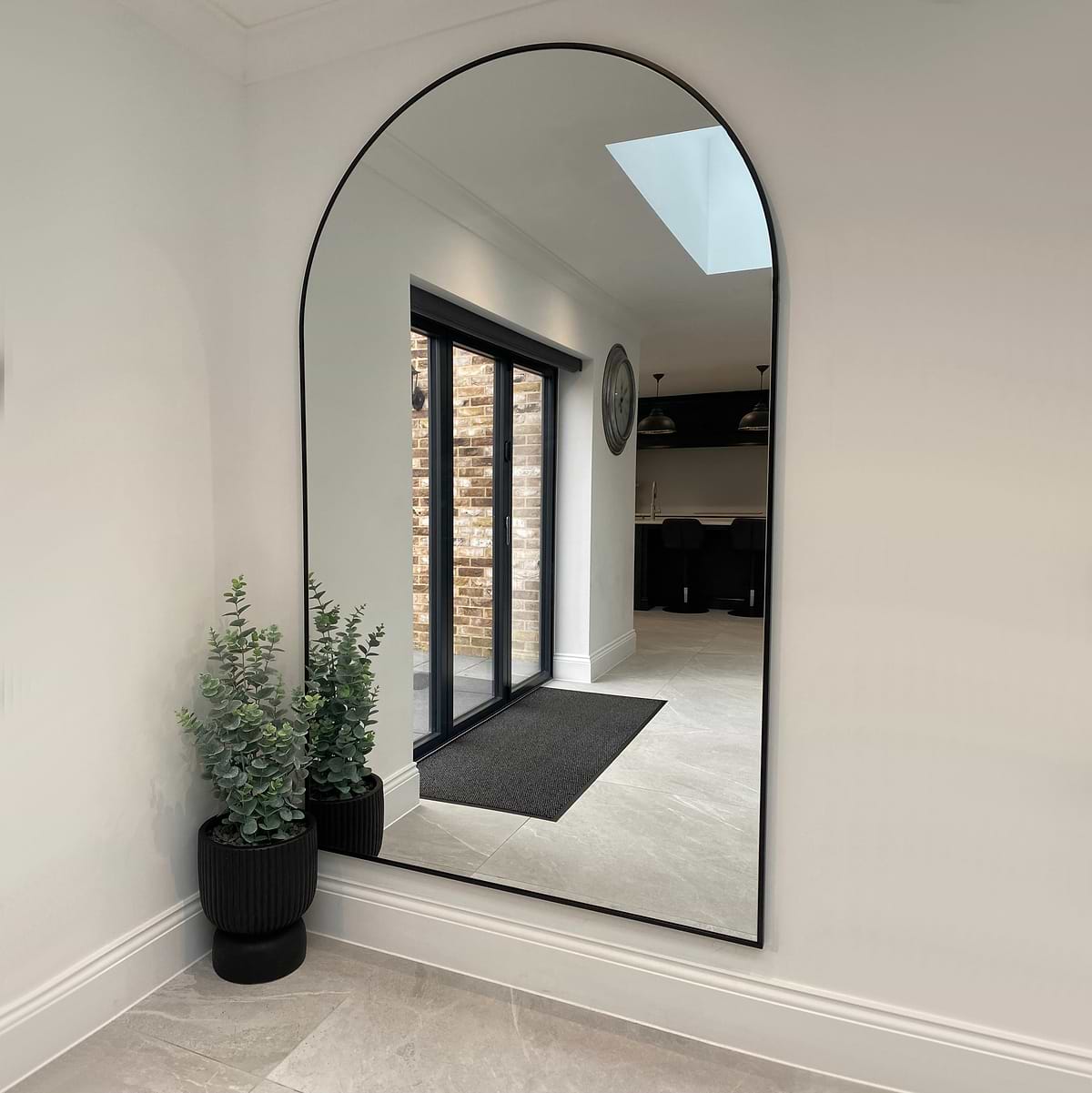 Black Full Length Arched Metal Mirror as kitchen wall mirror