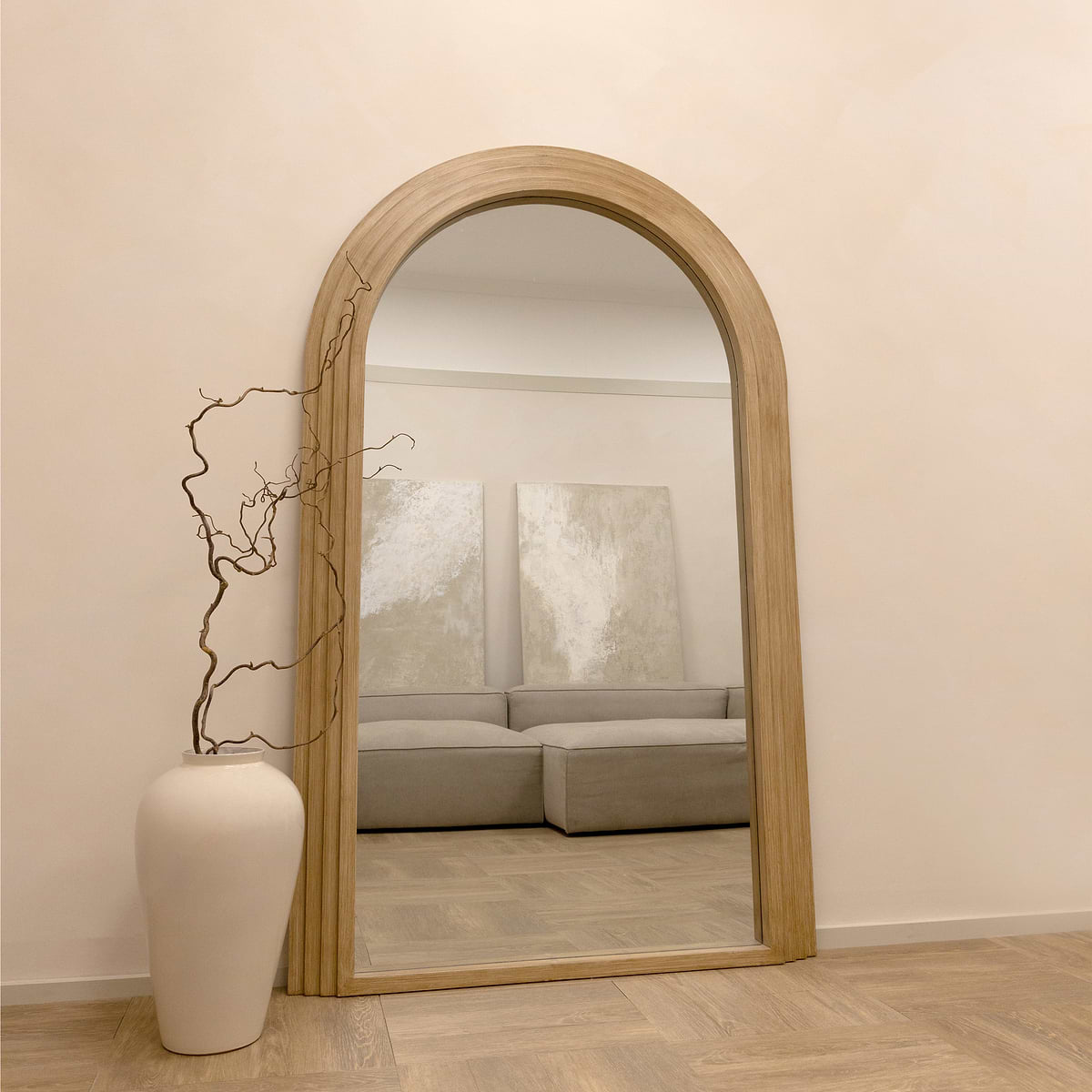 Full Length Arched Washed Wood Mirror in lounge opposite sofa
