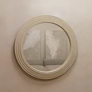 Round Concrete Wall Mirror displayed on wall