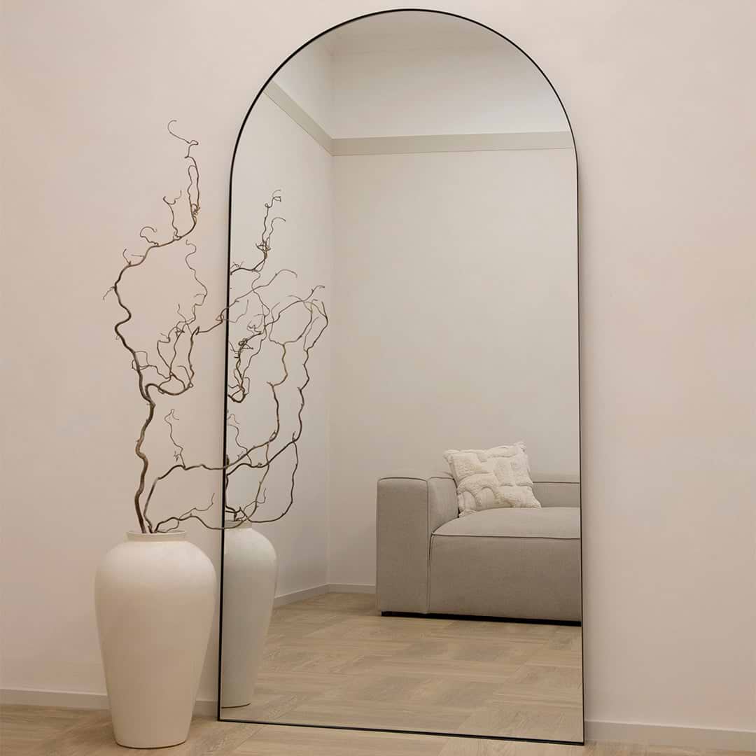 Full Length Black Arched Large Metal Mirror opposite sofa