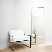 Full Length Black Rectangular Large Metal Mirror beside chair