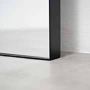 Full length black large metal mirror closeup