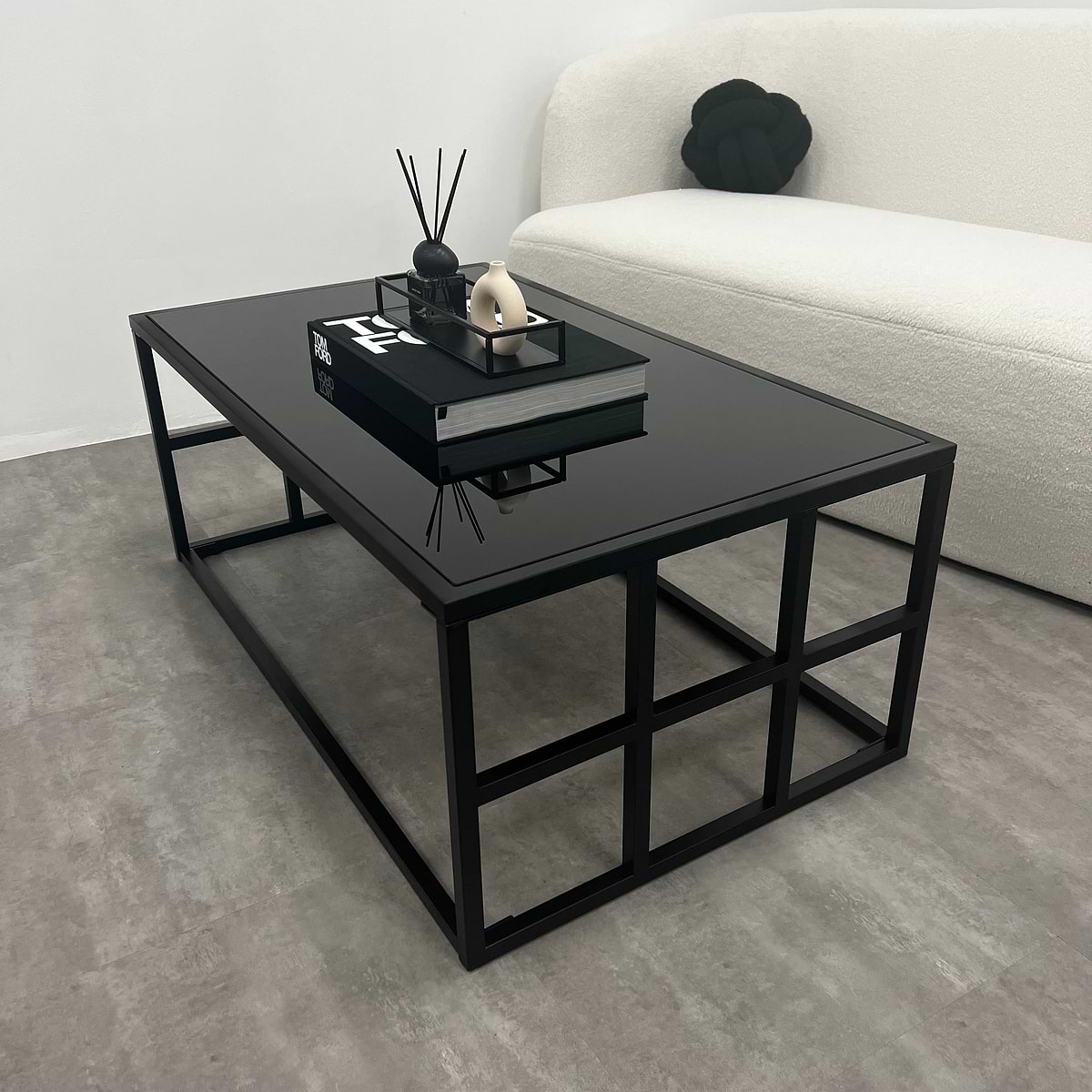 Black modern large rectangle tinted mirrored coffee table in living room