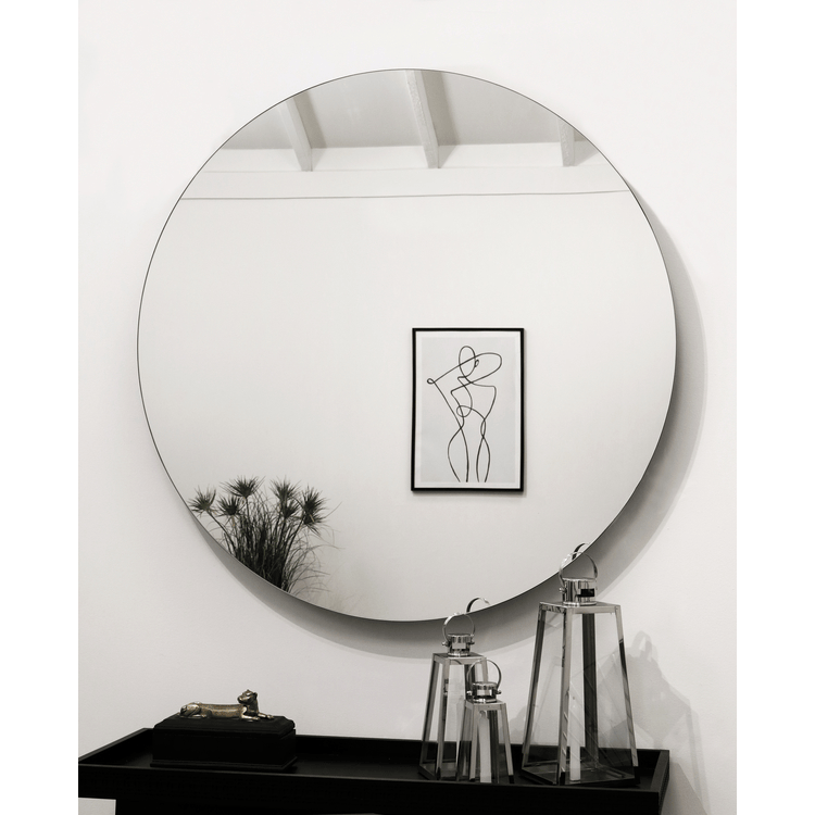 Large Frameless Round Wall Mirror reflecting painting