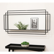 Large black rectangular metal mirror displayed on wall