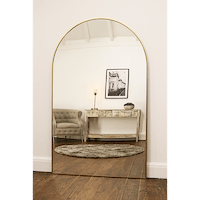 Gold Full Length Arched Metal Mirror as a lounge lean to