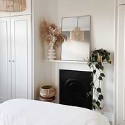 Gold Rectangular Metal Wall Mirror on mantlepiece