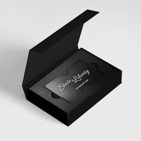 Black card with 'State of Liberty' branding in an open black box on a light gray background