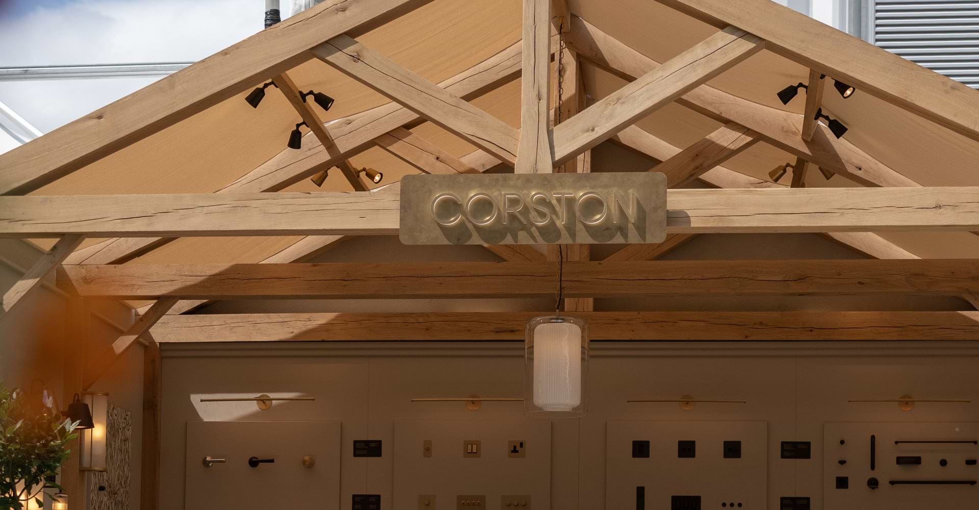 The image features a wooden structure with a sign reading