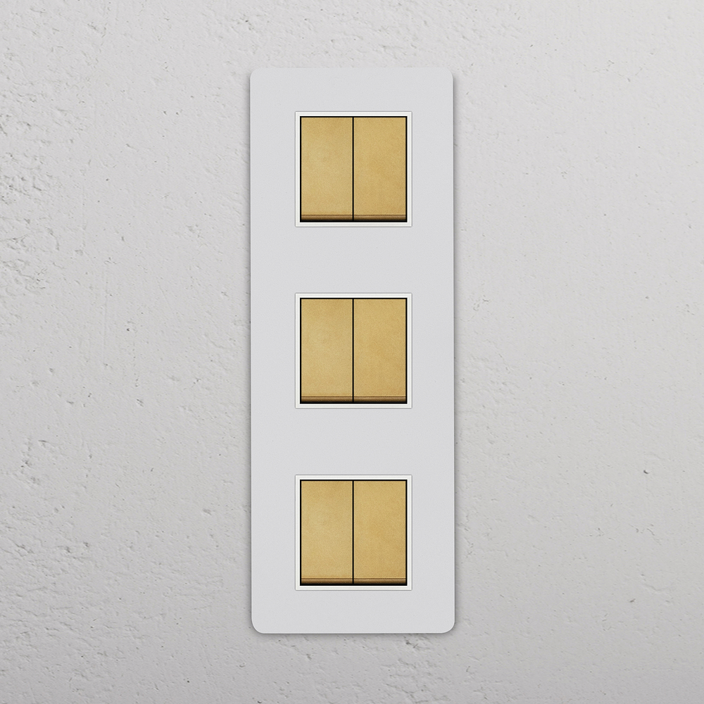 Grove Triple 6x Vertical Rocker Switch – Paintable Antique Brass | White