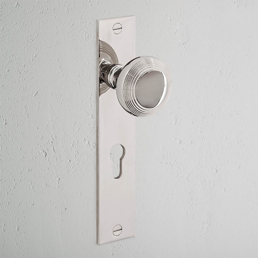 Poplar Long Plate Sprung Door Knob & Euro Lock - Polished Nickel