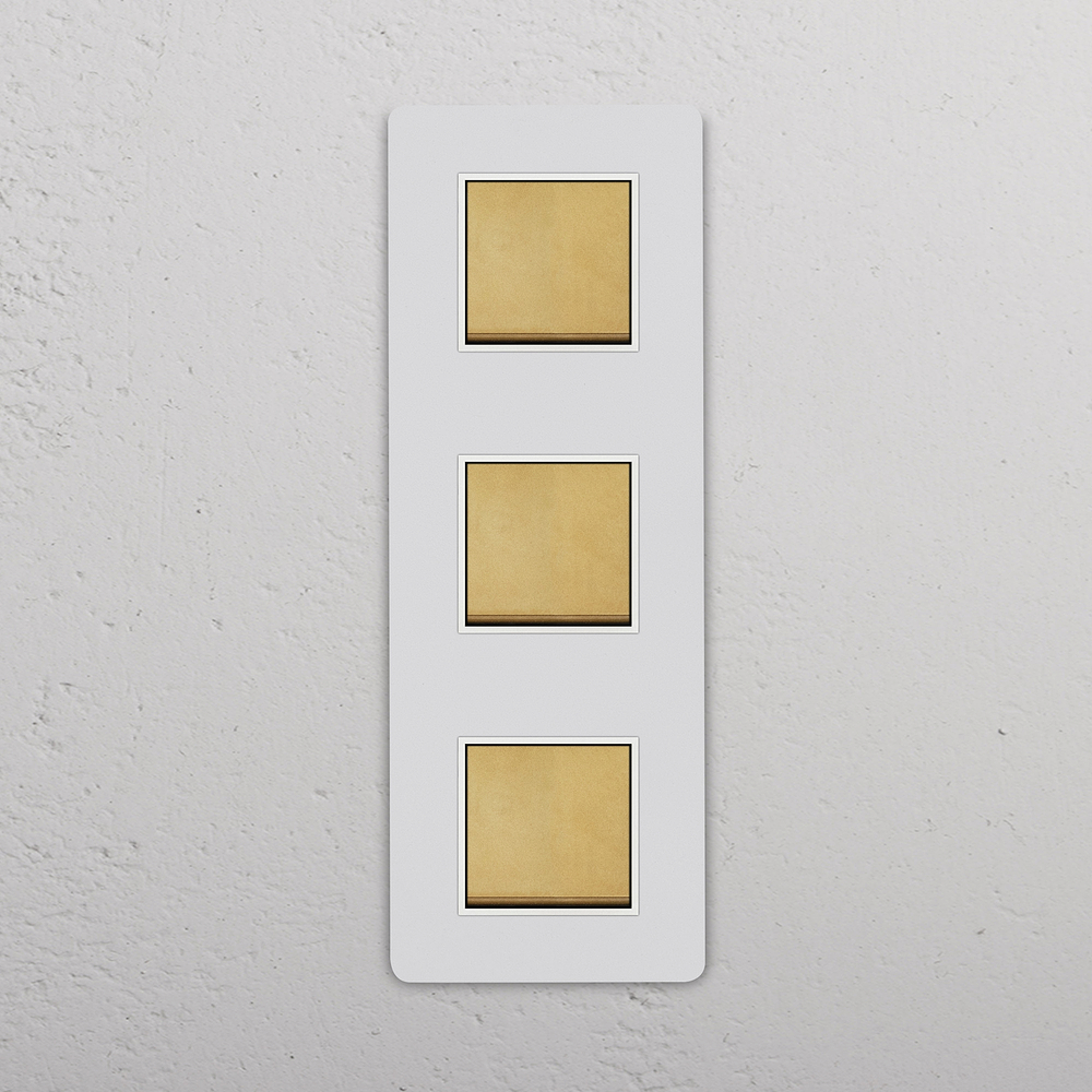 Grove Triple 3x Vertical Rocker Switch – Paintable Antique Brass | White