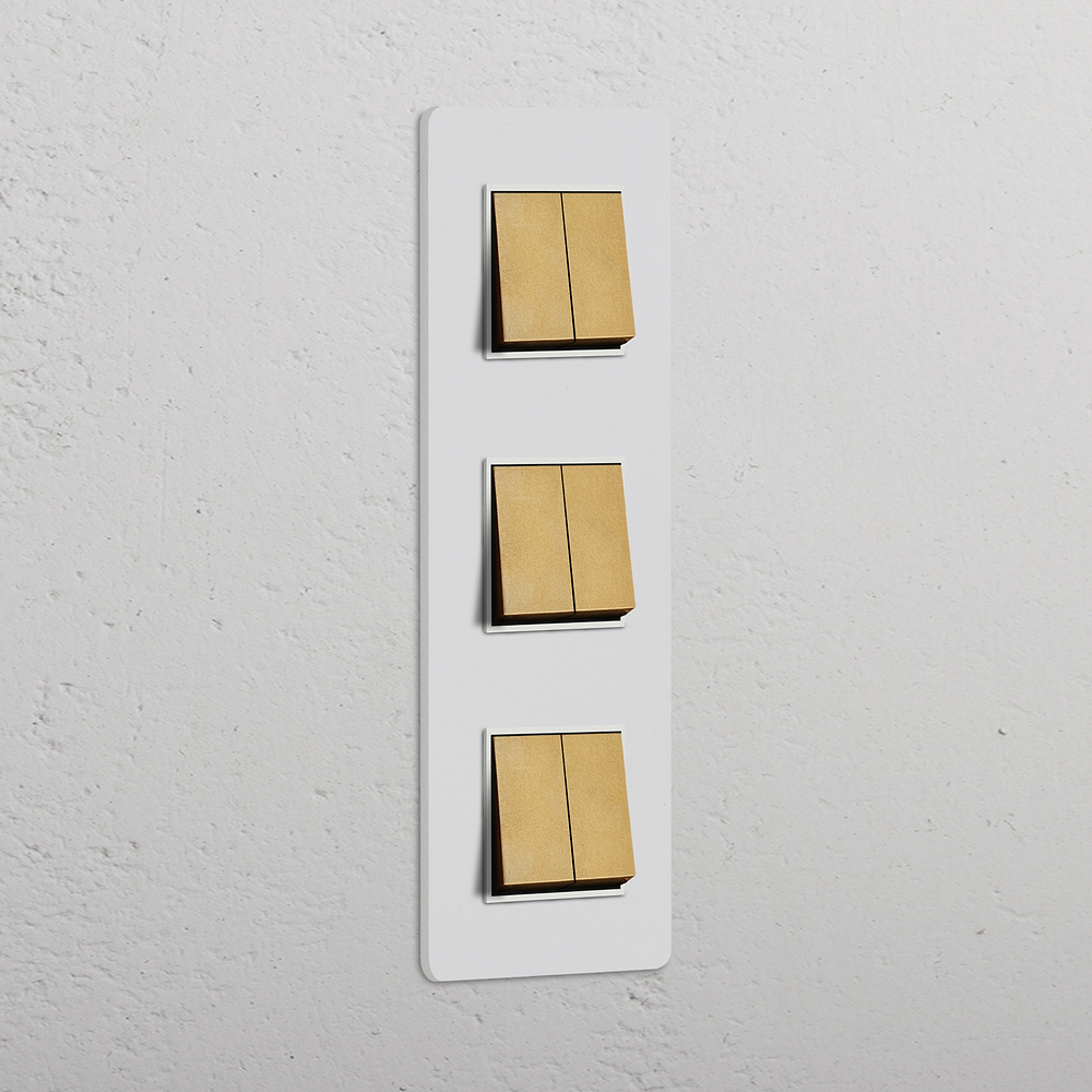 Grove Triple 6x Vertical Rocker Switch – Paintable Antique Brass | White