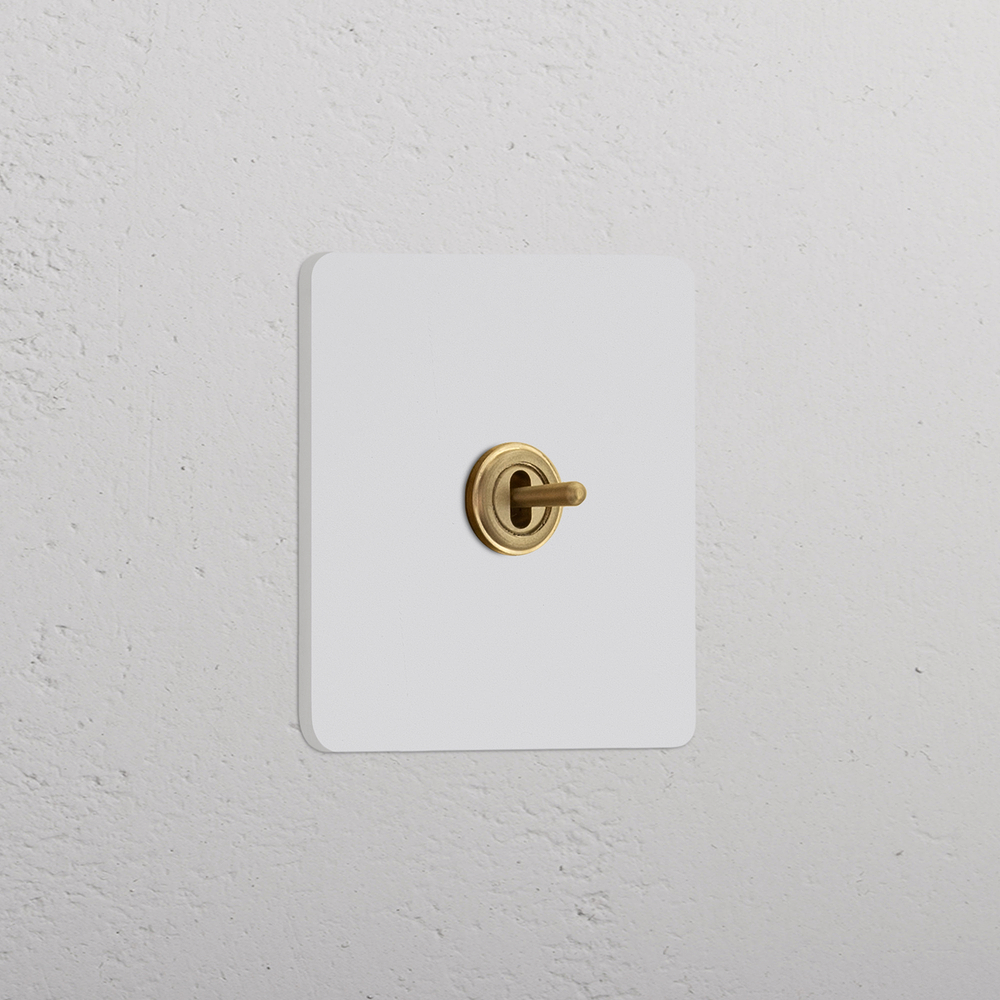 Grove Single Centre Retractive Toggle Switch – Paintable Antique Brass