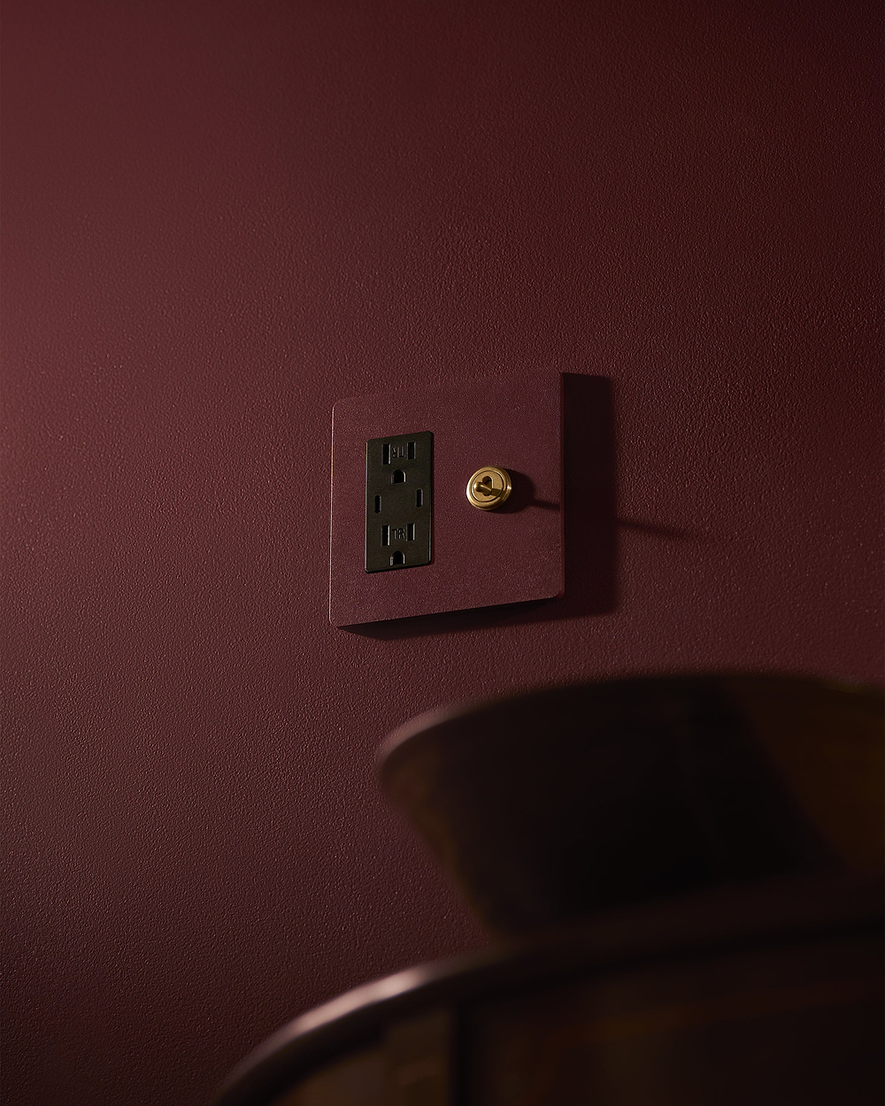 Grove 2G Toggle Switch & Outlet – Paintable Antique Brass | Black