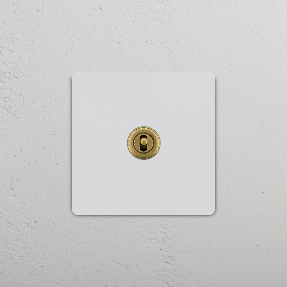 Grove Single Centre Retractive Toggle Switch – Paintable Antique Brass