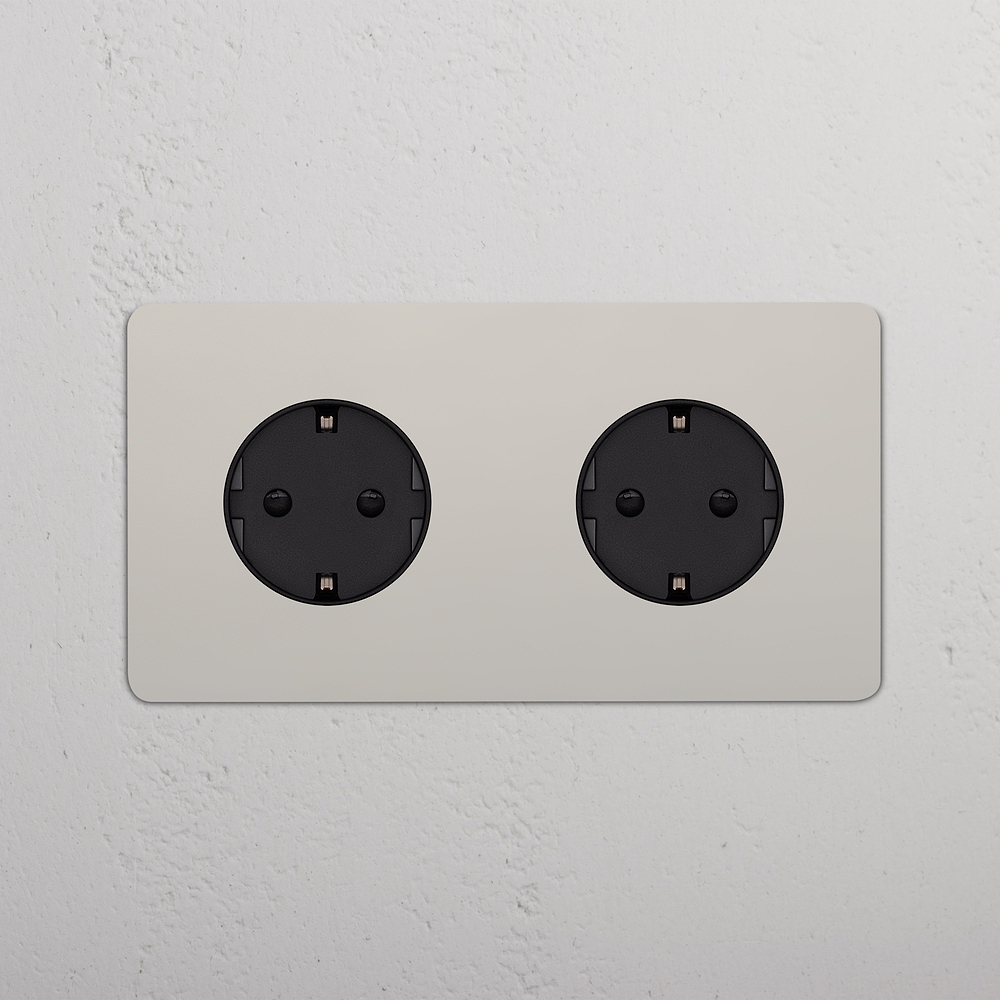 Kew SchuKo-Steckdoseneinsatz (Typ F) 2x in Zweifachrahmen – Poliertes Nickel | Schwarz