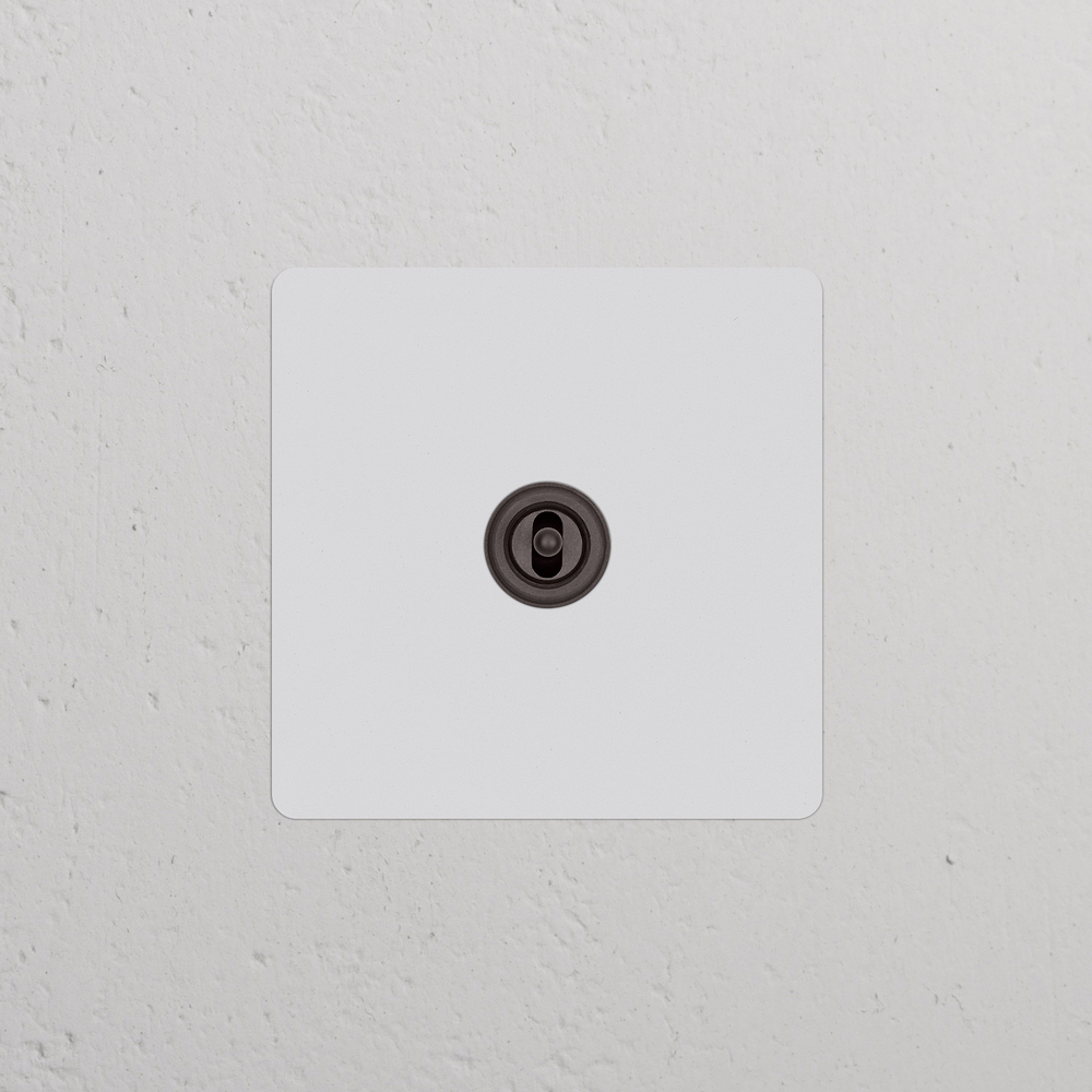 Kew Single Centre Retractive Toggle Switch - Paintable Bronze