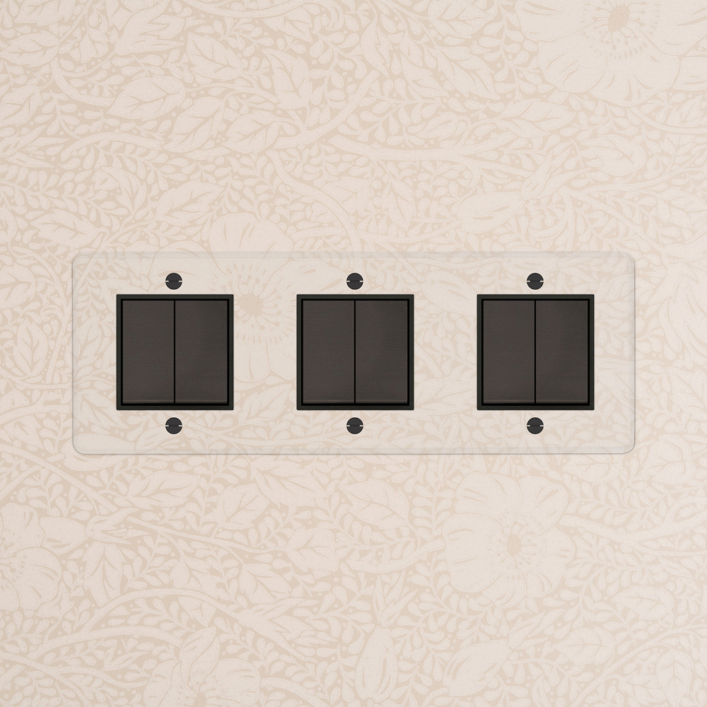 Kew Wippschalter 6x in Dreifachrahmen – Transparent Bronze | Schwarz