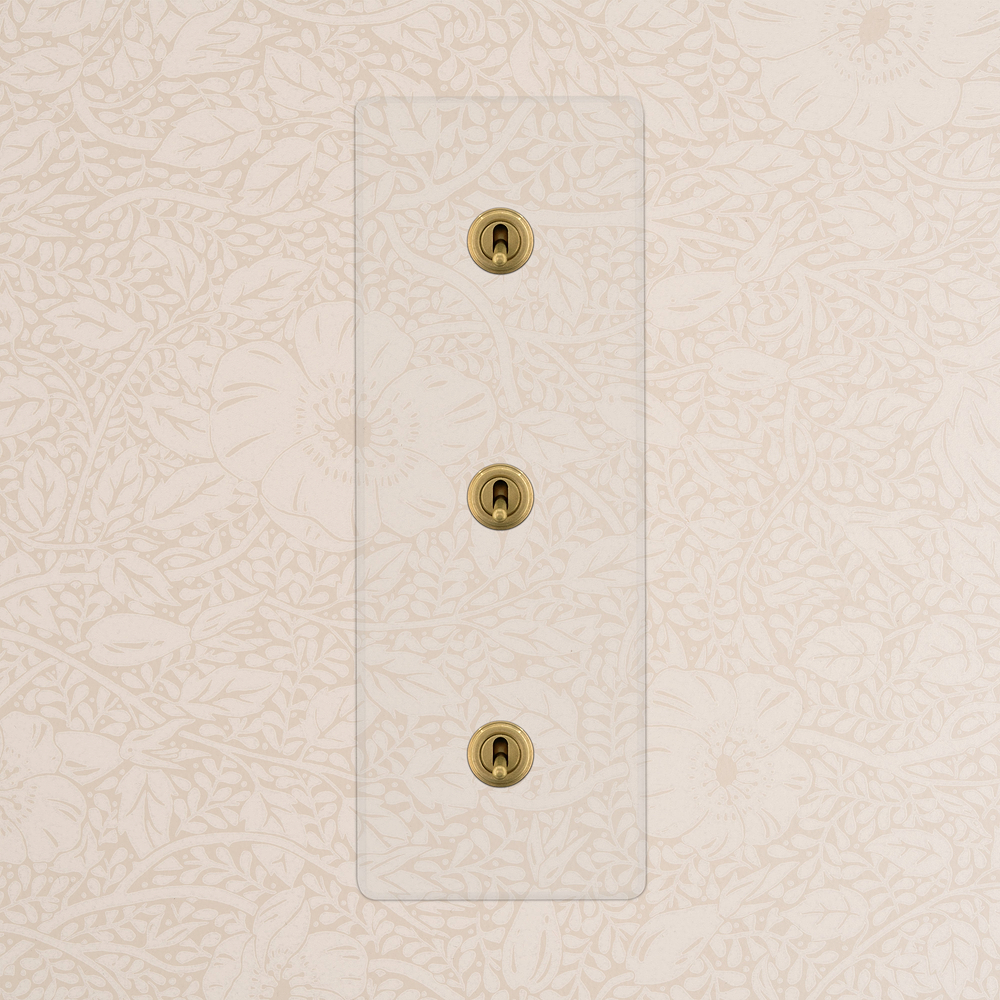 Kew Kipphebelschalter 3x in vertikalem Dreifachrahmen – Transparent + Antikes Messing