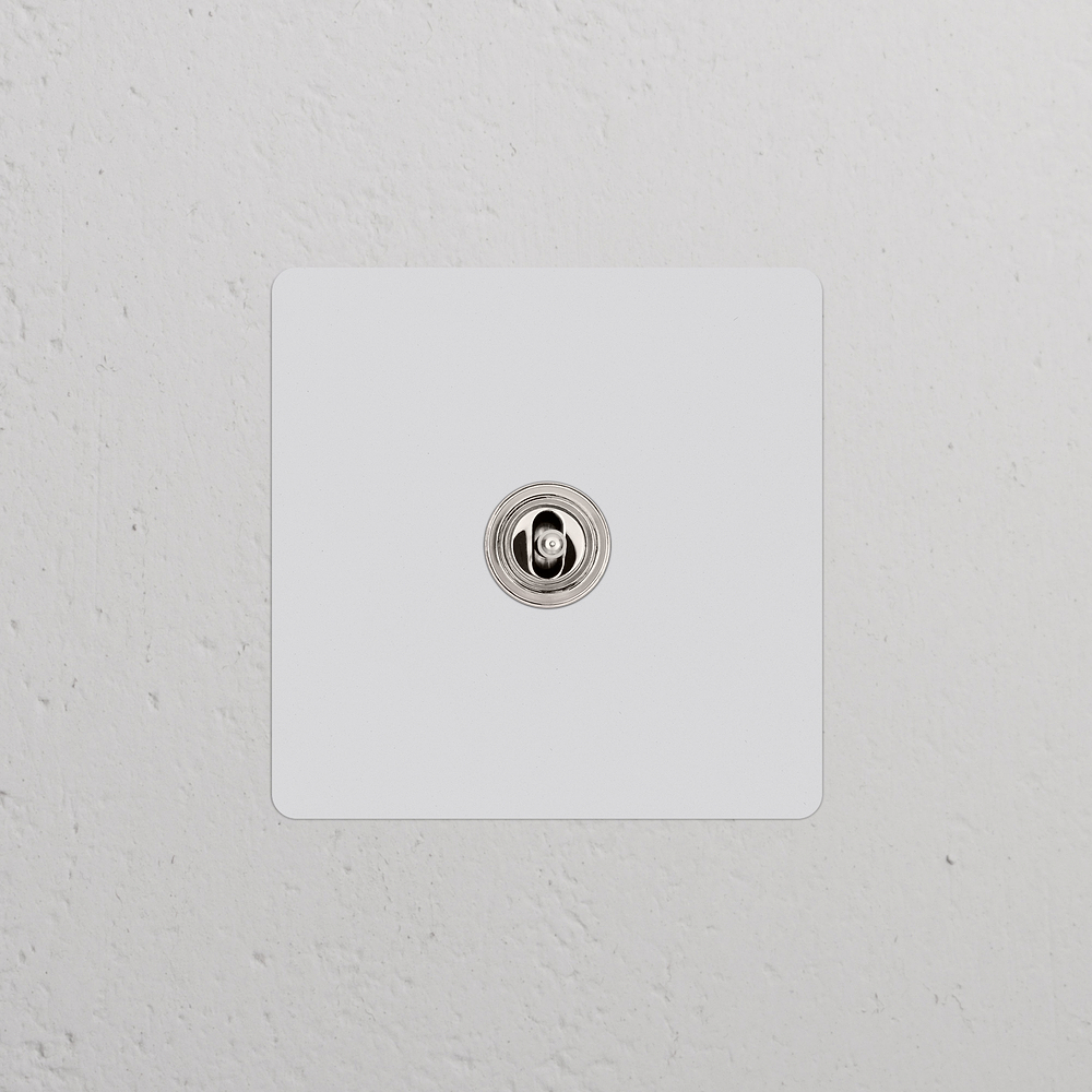 Kew Single Centre Retractive Toggle Switch - Paintable Polished Nickel
