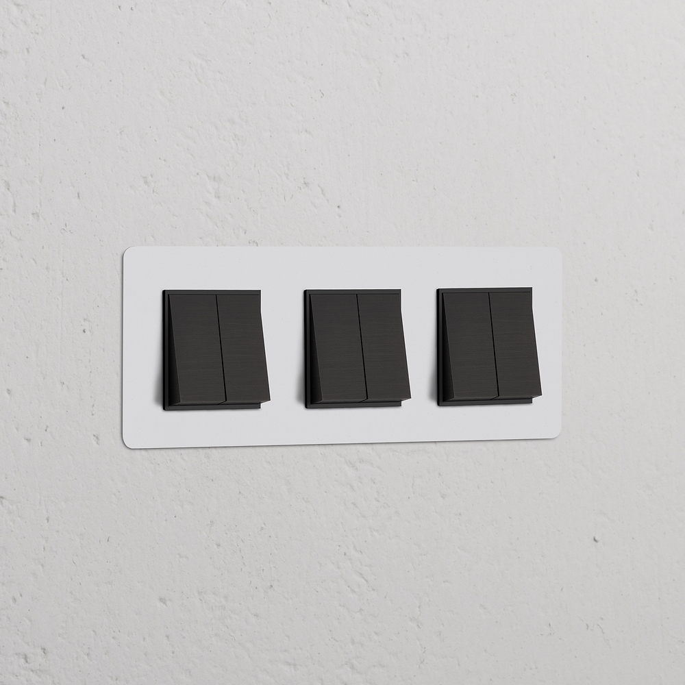 Kew Interruptor conmutador de balancín x6 (marco triple) – Bronce y pintable | Negro