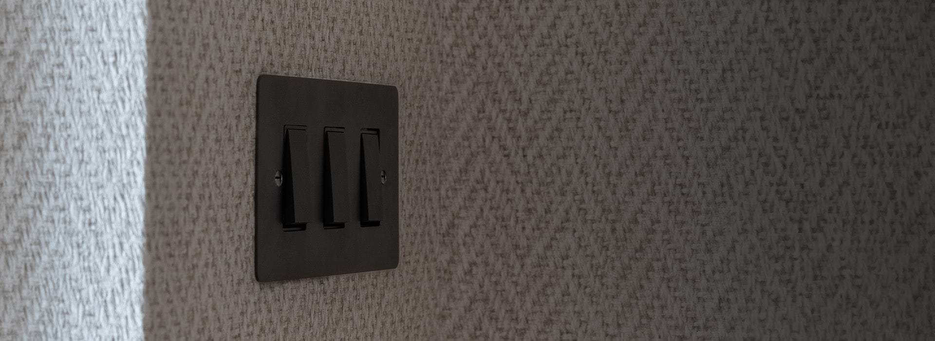 bronze 2x CAT6 socket on left, double socket with USB-C fast charge middle and 3G toggle light switch on right