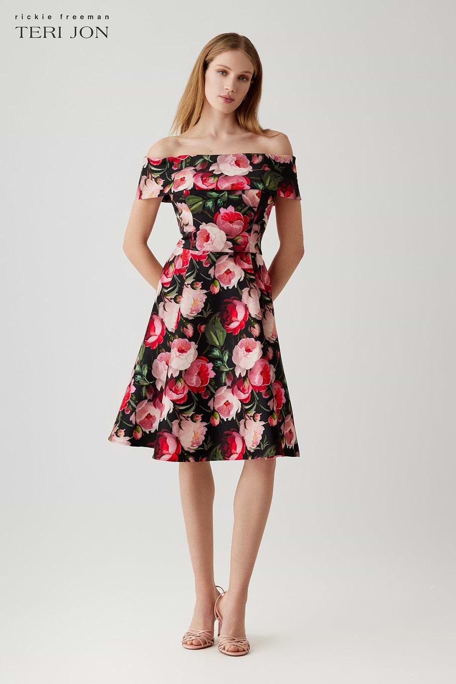 fit and flare cocktail dress Dave & Johnny Elegant floral lace fabric for a refined look Boned bodice provides structure and support Ruffled tiered hem adds playful movement Strapless straight neckline for a modern touch Perfectly petite Royal Blue Fit And Flare