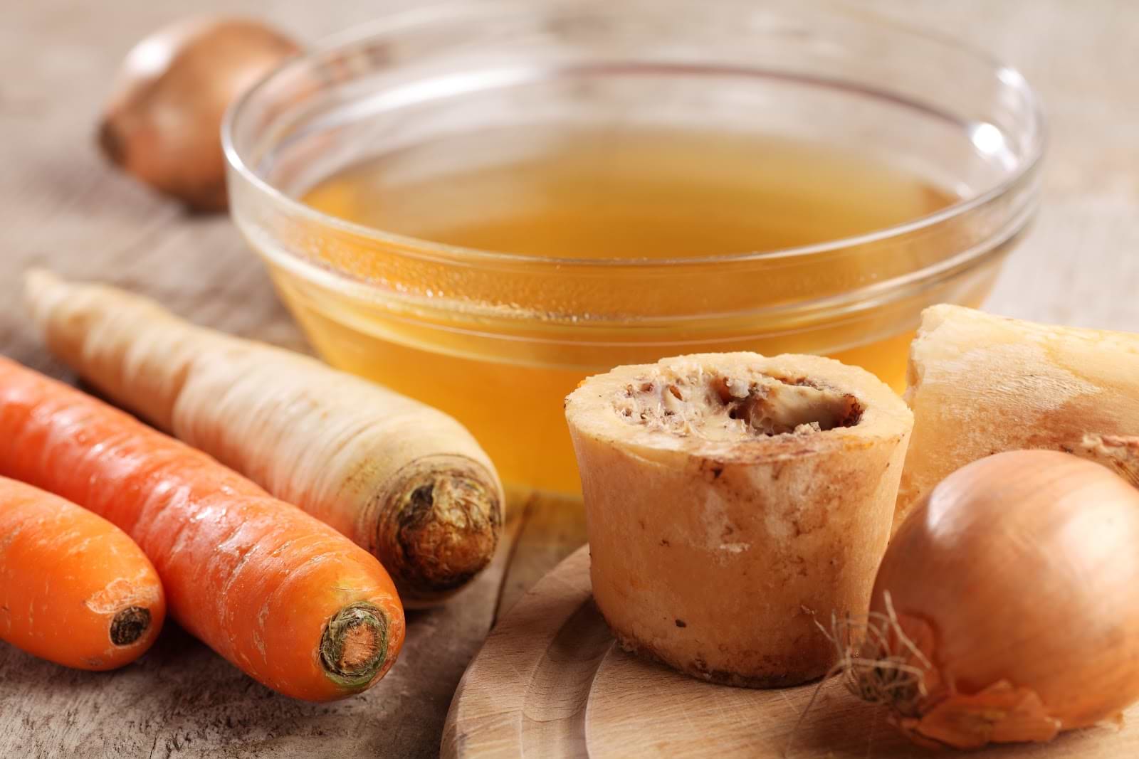 How Much Bone Broth Should I Drink Daily? Beef bone broth with carrots