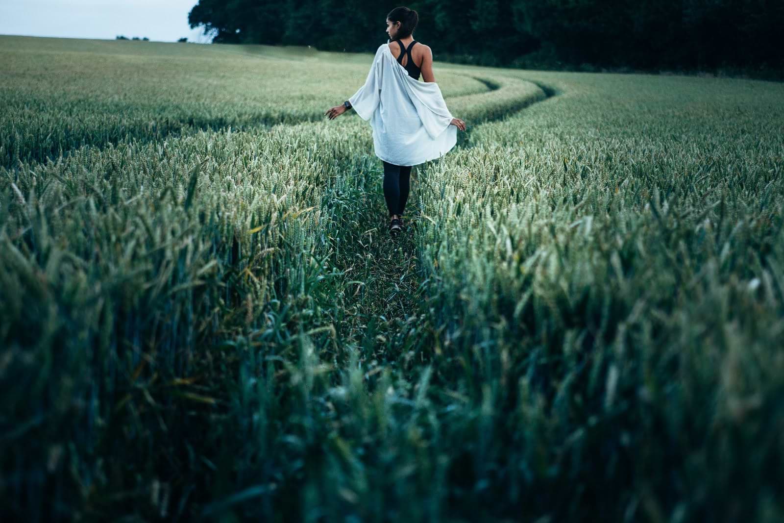Gut dysbiosis: A woman walks through a field