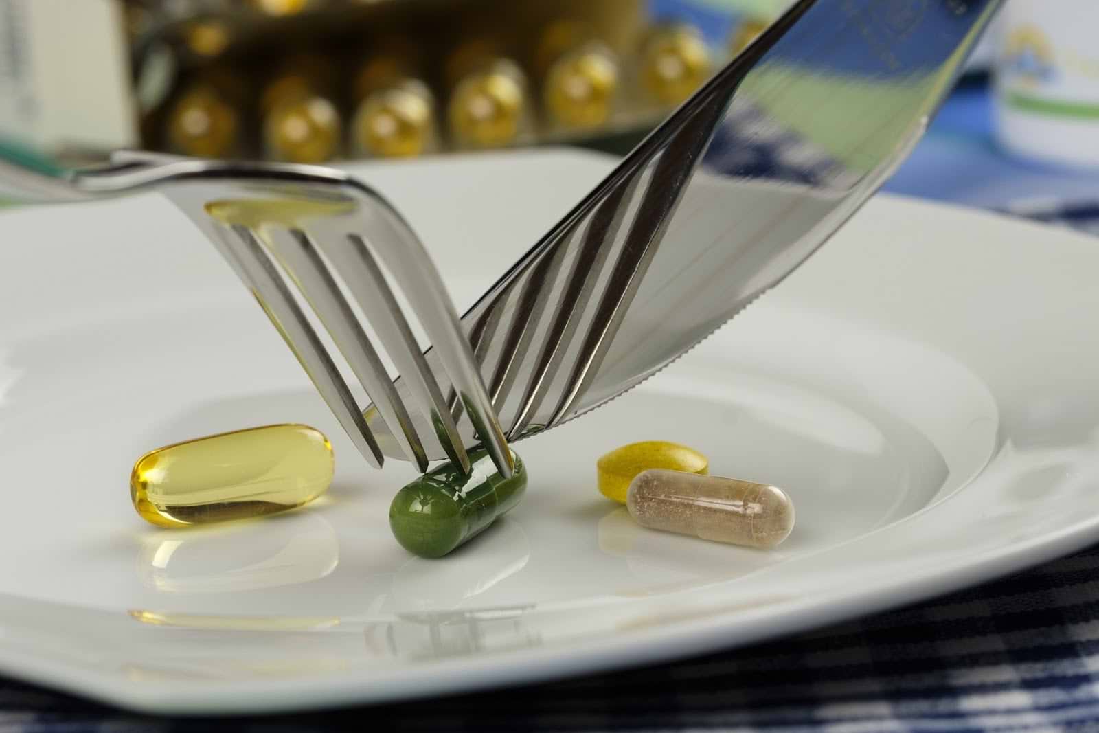 Supplements for inflammation: A fork and knife try to cut a supplement pill