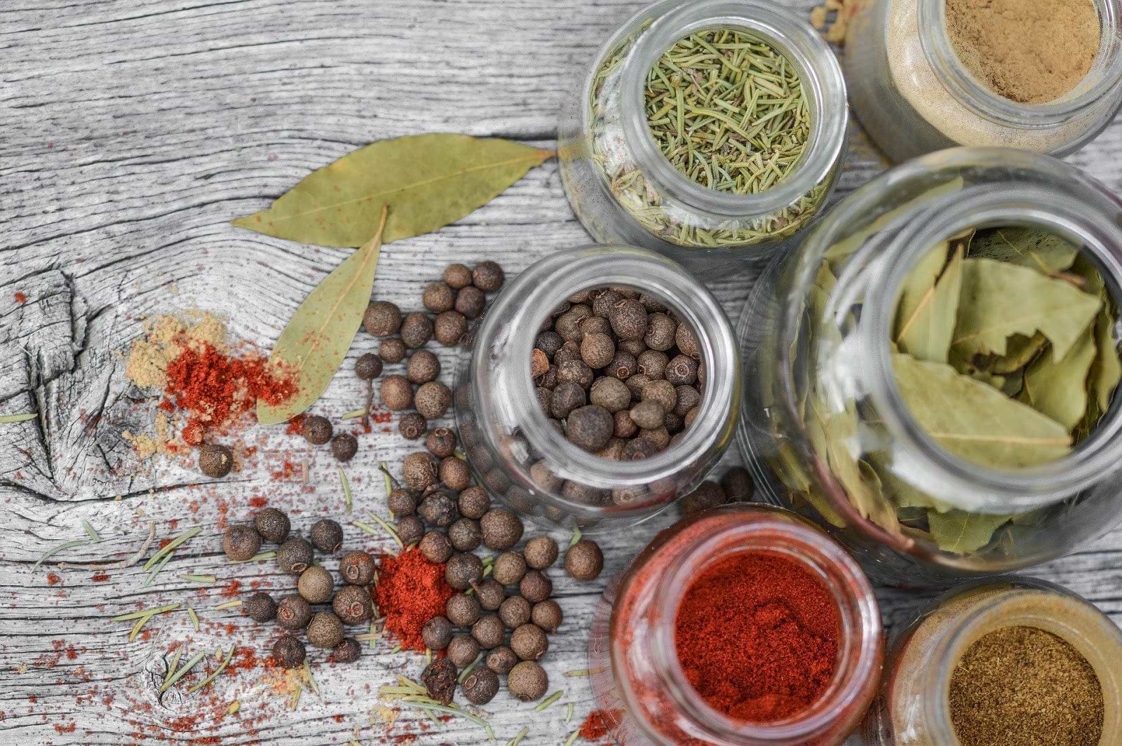 Herbs for inflammation: jars of herbs and spices